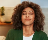 Close up shot of a woman feeling relieved.