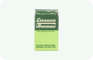 Green and white packaging of Laxans Thomae, 50 dragées à 0,005 g.